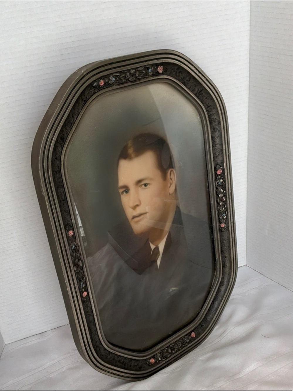Antique-Style Oval Framed Portrait in gray frame with floral accents